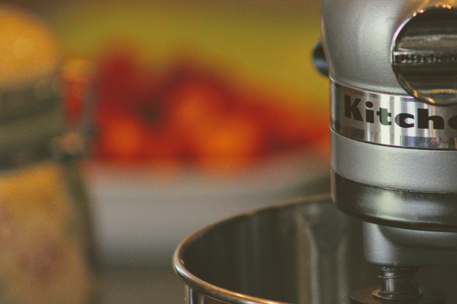Planetary stand mixer with dough hook mixing bread dough